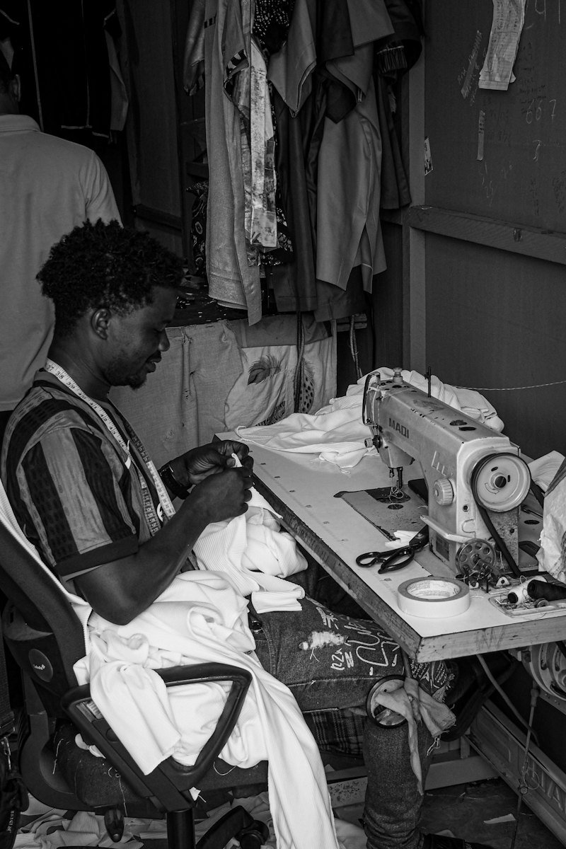 A tailor at his sewing machine